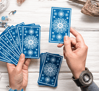 Intricate blue tarot cards fanned out, ready for reading, emphasizing mystical and spiritual insights, perfect for enhancing intuition and exploring tarot symbolism.