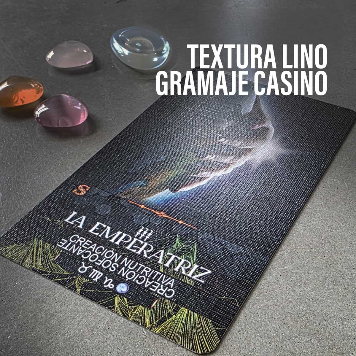 Colorful polished gemstone crystals surrounding a detailed tarot card featuring the Empress, emphasizing spiritual empowerment, nurturing energy, and intuitive tarot insights for personal growth and divination.